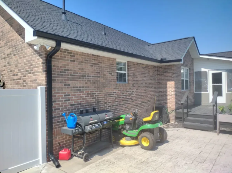 Backyard gutter and downspout installation